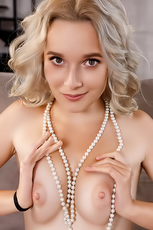 Loli Pops Silky Skin Enhances Her Allure on a Nude Bedroom Session