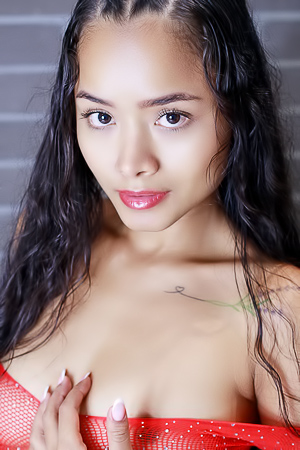 Liloo Teases in Lingerie on Red-Drape Bed